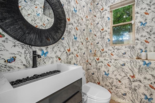 18330 Hanan Ct, Tarzana, CA 91356 - bathroom featuring wallpapered walls and vanity