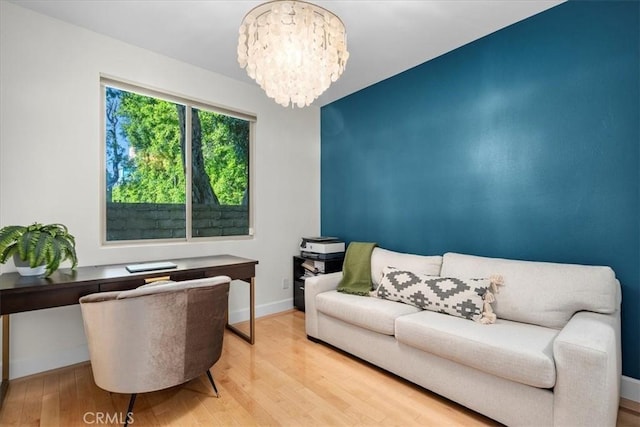 18330 Hanan Ct, Tarzana, CA 91356 - living area featuring a chandelier, light wood-style floors, and a desk