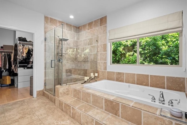 18330 Hanan Ct, Tarzana, CA 91356 - full bathroom featuring a bath, a shower stall, and a walk in closet