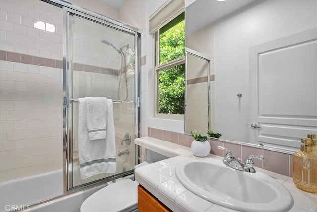 18330 Hanan Ct, Tarzana, CA 91356 - bathroom featuring vanity and shower / bath combination with glass door