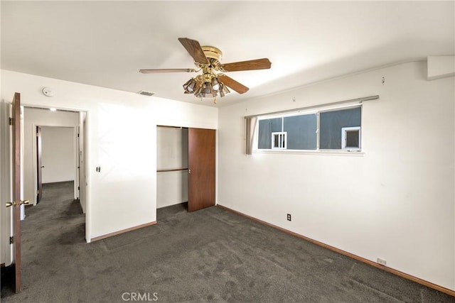 625 S Valley St, Anaheim, CA 92804 - unfurnished bedroom with a closet, dark colored carpet, and a ceiling fan