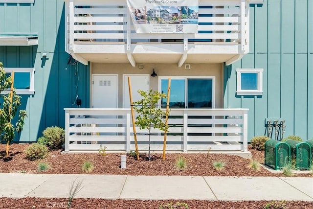 3802 Ranch House Rd Unit 102, San Luis Obispo, CA 93401 - property entrance with board and batten siding
