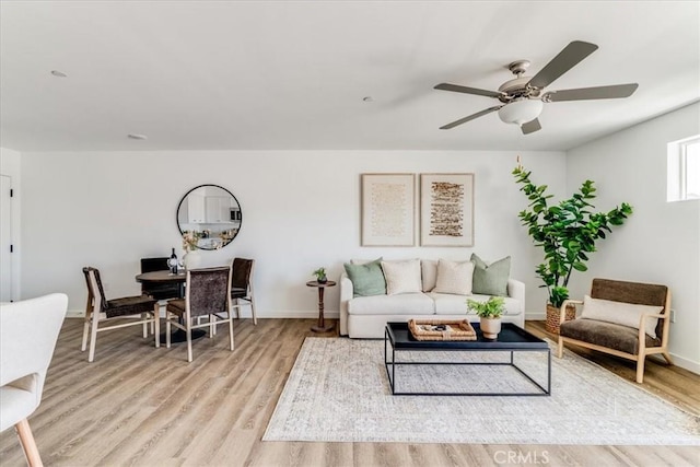 3802 Ranch House Rd Unit 102, San Luis Obispo, CA 93401 - living room with light wood-style floors and ceiling fan