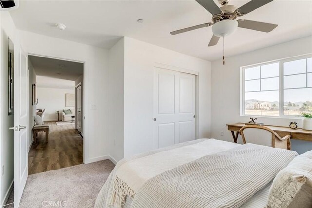 3802 Ranch House Rd Unit 102, San Luis Obispo, CA 93401 - carpeted bedroom featuring a closet and ceiling fan