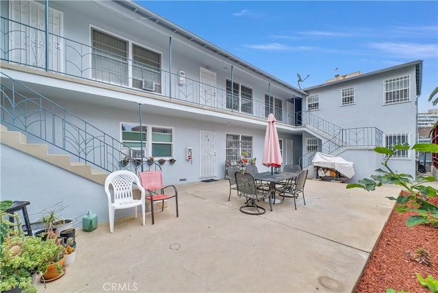122 Elm Ave Unit 9, Long Beach, CA 90802 - view of patio / terrace featuring stairway and outdoor dining space