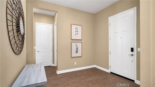 126 Luneta Ln, Rancho Mission Viejo, CA 92694 - entrance foyer with dark wood-style floors and baseboards