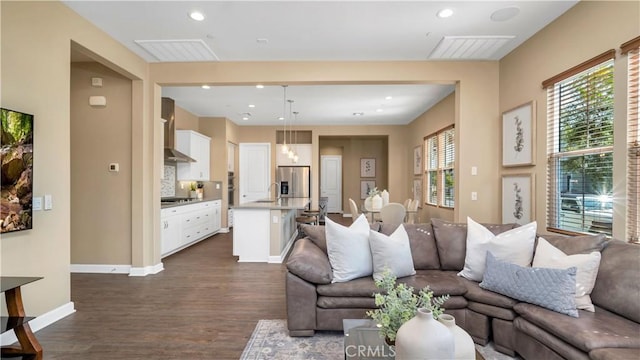 126 Luneta Ln, Rancho Mission Viejo, CA 92694 - living room with dark wood-style flooring and recessed lighting