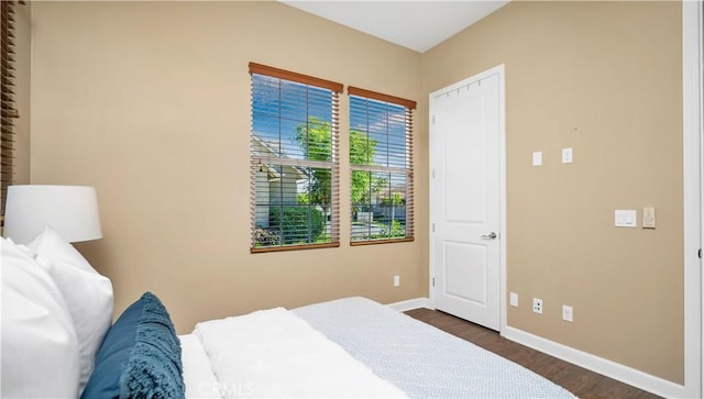126 Luneta Ln, Rancho Mission Viejo, CA 92694 - bedroom with baseboards and dark wood-style floors