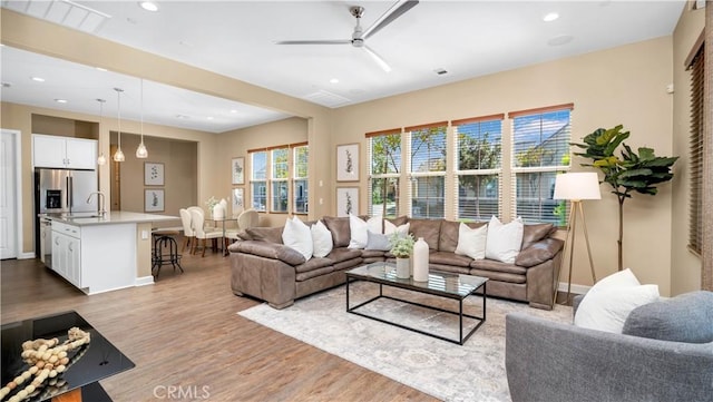 126 Luneta Ln, Rancho Mission Viejo, CA 92694 - living area with wood finished floors, a ceiling fan, and recessed lighting