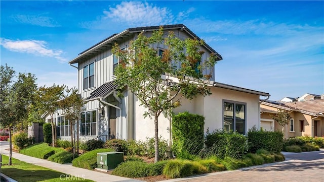 126 Luneta Ln, Rancho Mission Viejo, CA 92694 - view of property exterior with a garage and stucco siding