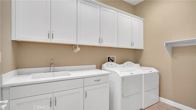 126 Luneta Ln, Rancho Mission Viejo, CA 92694 - laundry room with cabinet space and washer and clothes dryer
