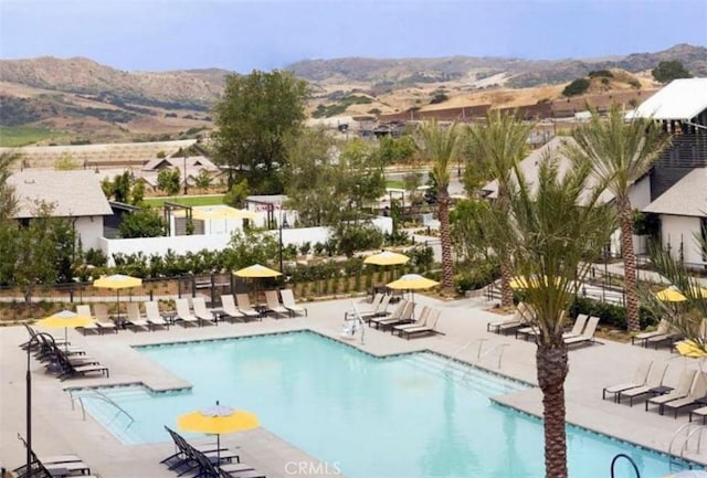 126 Luneta Ln, Rancho Mission Viejo, CA 92694 - community pool with a mountain view and a patio
