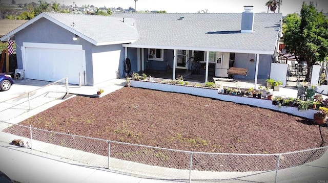 101 Lancer Ave, Oceanside, CA 92058 - view of front of house featuring a garage, a shingled roof, a chimney, and concrete driveway