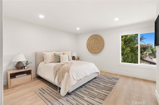 20371 Allport Ln, Huntington Beach, CA 92646 - bedroom with light wood-style flooring and recessed lighting