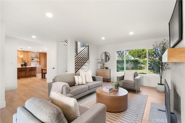 20371 Allport Ln, Huntington Beach, CA 92646 - living room with stairway, light wood-style floors, and recessed lighting