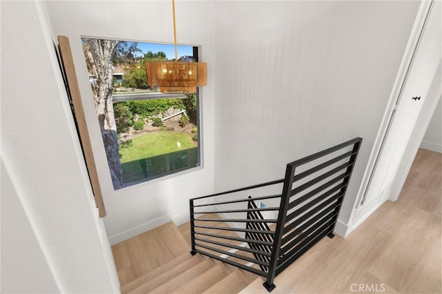 20371 Allport Ln, Huntington Beach, CA 92646 - stairs featuring wood finished floors and baseboards