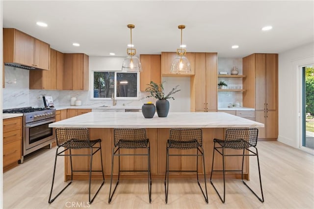 20371 Allport Ln, Huntington Beach, CA 92646 - kitchen with stainless steel range with gas cooktop, backsplash, light wood-type flooring, open shelves, and recessed lighting