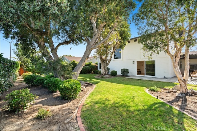 20371 Allport Ln, Huntington Beach, CA 92646 - view of green lawn with a patio area