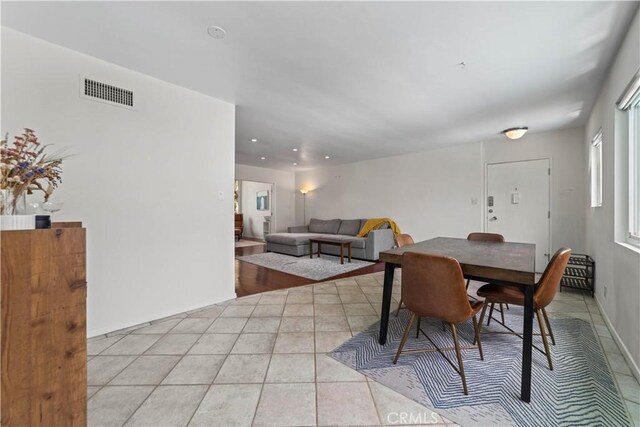 1525 N Hayworth Ave Unit 205, Los Angeles, CA 90046 - dining area with light tile patterned floors and recessed lighting