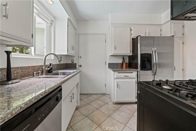 1525 N Hayworth Ave Unit 205, Los Angeles, CA 90046 - kitchen with appliances with stainless steel finishes, white cabinets, and ventilation hood