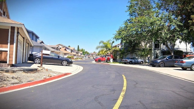 5312 Caminito Cachorro, San Diego, CA 92105 - view of asphalt road with a residential view and curbs