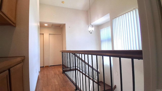 5312 Caminito Cachorro, San Diego, CA 92105 - hallway with an upstairs landing and light wood finished floors