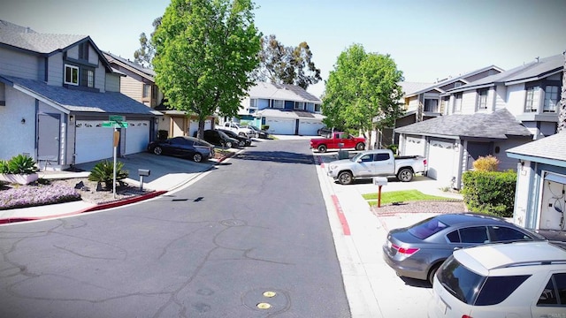5312 Caminito Cachorro, San Diego, CA 92105 - view of asphalt road with a residential view, sidewalks, and curbs