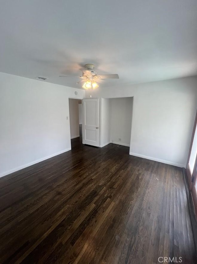 717 N Valley St, Toluca Lake, CA 91505 - unfurnished room featuring dark wood-style flooring and a ceiling fan