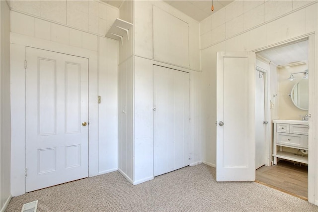 128 N Mason St, Arroyo Grande, CA 93420 - unfurnished bedroom featuring light colored carpet and a closet