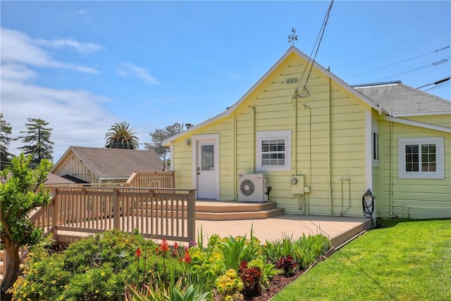 128 N Mason St, Arroyo Grande, CA 93420 - rear view of property featuring a deck and a lawn