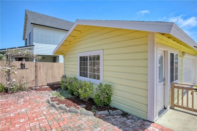 128 N Mason St, Arroyo Grande, CA 93420 - view of side of property with a shingled roof