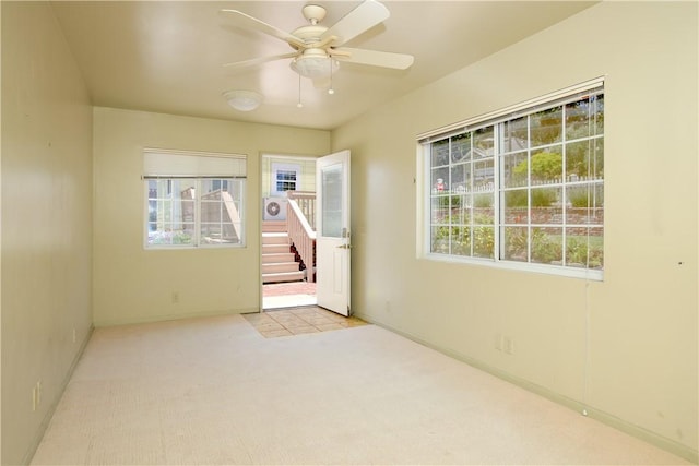 128 N Mason St, Arroyo Grande, CA 93420 - spare room featuring a ceiling fan, carpet floors, and stairs