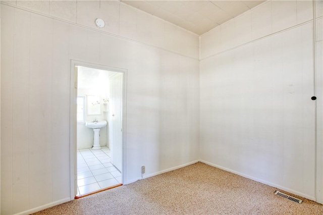 128 N Mason St, Arroyo Grande, CA 93420 - carpeted spare room featuring baseboards