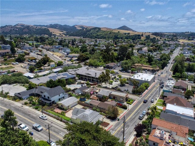 128 N Mason St, Arroyo Grande, CA 93420 - aerial view of property's location with a mountainous background and nearby suburban area