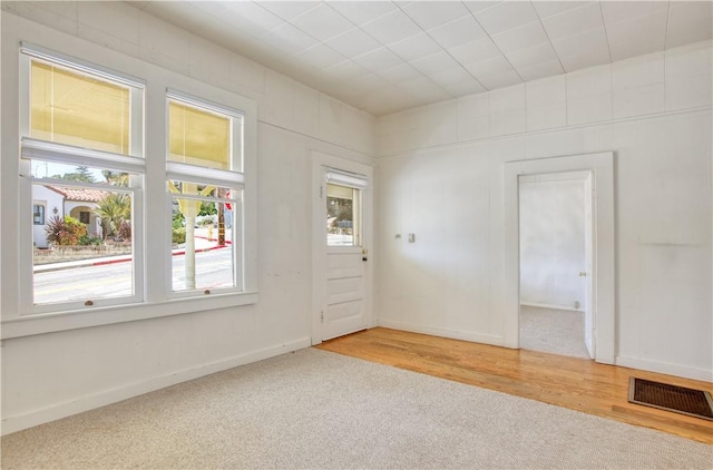 128 N Mason St, Arroyo Grande, CA 93420 - empty room featuring light carpet and baseboards