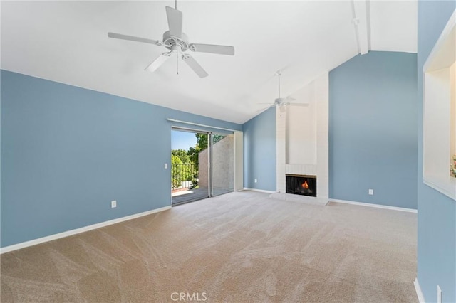 17430 Plaza Otonal, San Diego, CA 92128 - unfurnished living room featuring a ceiling fan, carpet floors, beamed ceiling, a brick fireplace, and high vaulted ceiling