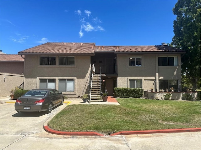 17430 Plaza Otonal, San Diego, CA 92128 - view of front facade with a tile roof, stairs, and stucco siding