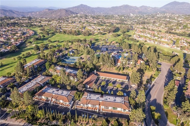 17430 Plaza Otonal, San Diego, CA 92128 - aerial overview of property's location featuring a mountainous background, a golf course, and nearby suburban area