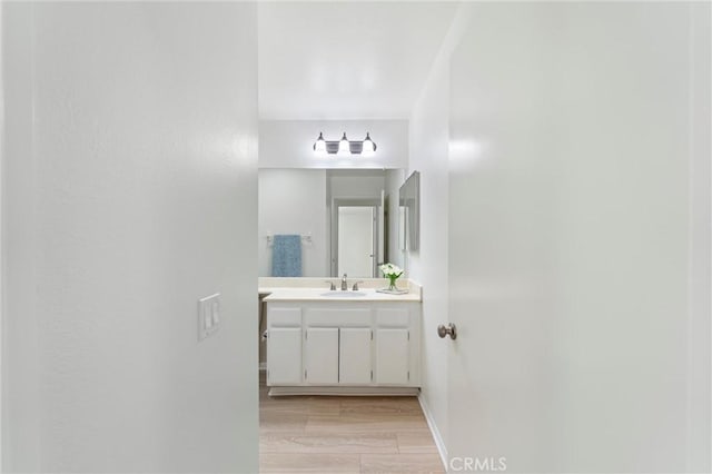 17430 Plaza Otonal, San Diego, CA 92128 - bathroom with vanity and baseboards