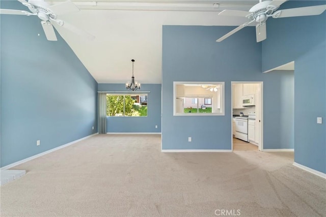 17430 Plaza Otonal, San Diego, CA 92128 - unfurnished living room with a ceiling fan, high vaulted ceiling, light carpet, and a chandelier