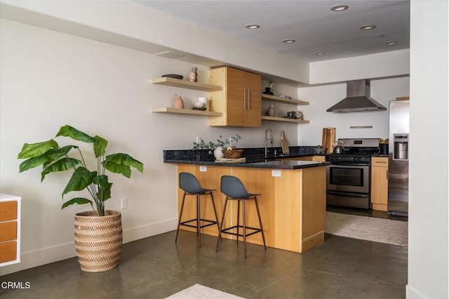 5232 Satsuma Ave Unit 106, North Hollywood, CA 91601 - kitchen with wall chimney exhaust hood, appliances with stainless steel finishes, open shelves, a peninsula, and a breakfast bar