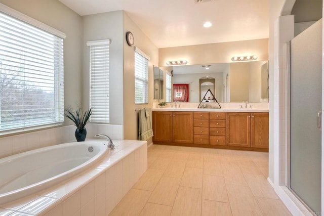 118 Double Eagle, Escondido, CA 92026 - bathroom featuring a bath, double vanity, and a stall shower
