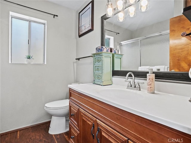 334 N Lomita St, Burbank, CA 91506 - full bath with vanity, a shower with door, wood finished floors, and plenty of natural light