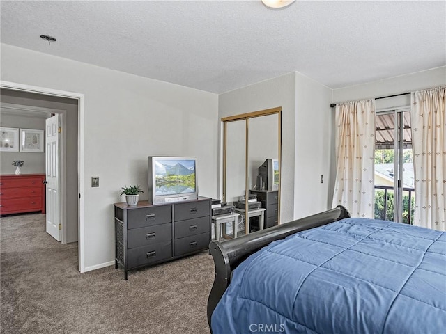 334 N Lomita St, Burbank, CA 91506 - carpeted bedroom with a closet, a textured ceiling, and access to outside