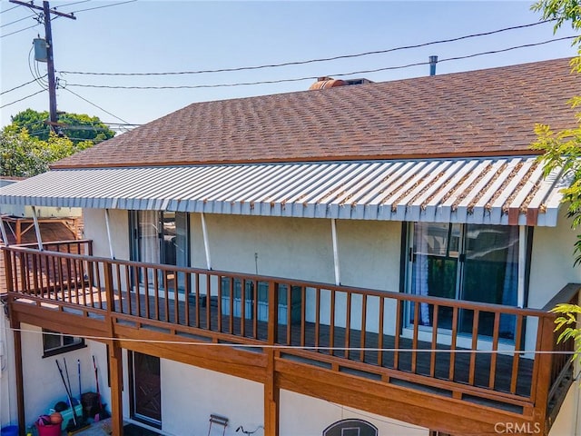 334 N Lomita St, Burbank, CA 91506 - back of house featuring stucco siding, a standing seam roof, a shingled roof, and a metal roof