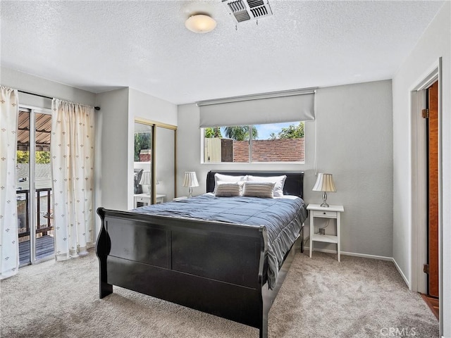 334 N Lomita St, Burbank, CA 91506 - bedroom with carpet floors, a textured ceiling, access to exterior, and a closet