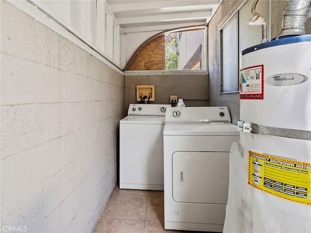 334 N Lomita St, Burbank, CA 91506 - laundry room featuring water heater, washing machine and dryer, light tile patterned floors, and concrete block wall