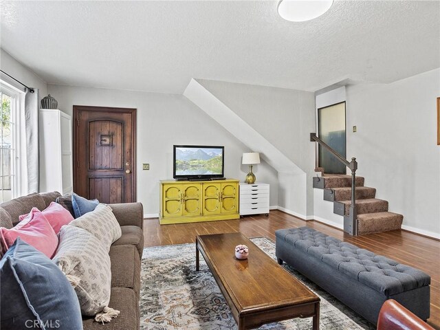 334 N Lomita St, Burbank, CA 91506 - living room with a textured ceiling, wood finished floors, and stairway