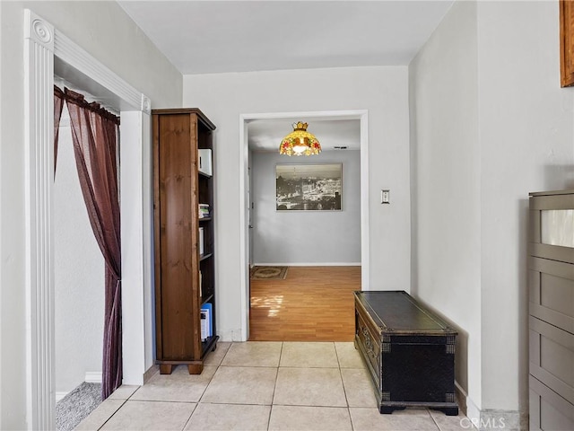 334 N Lomita St, Burbank, CA 91506 - corridor featuring light tile patterned flooring