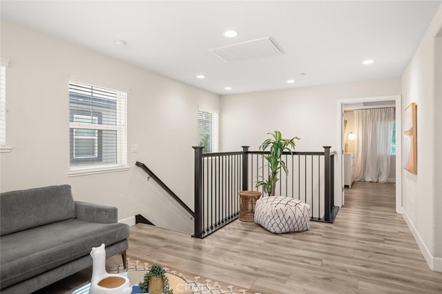27 Bentwater Loop, Chico, CA 95973 - living area with an upstairs landing, light wood-type flooring, and recessed lighting